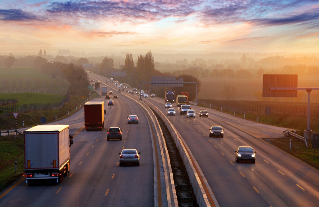 Motorway traffic at sunset